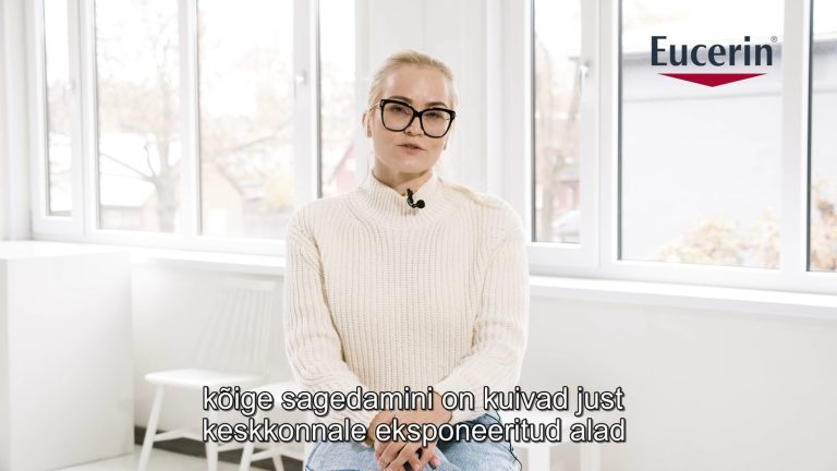 Video kaader: naine prillidega räägib, all eestikeelsed subtiitrid
